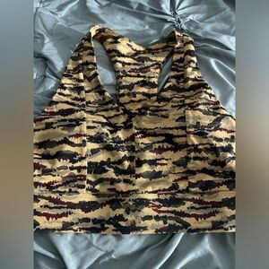 Fabletics On-The-Go Midi Medium Impact Sports
Bra S